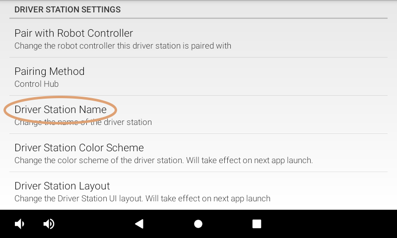 Driver Station settings screen showing the Driver Station Name highlighted with an orange circle.